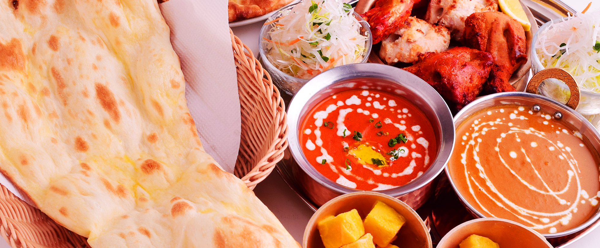 スワガタムのバターチキンカレーとポークカレーのペアセットランチ